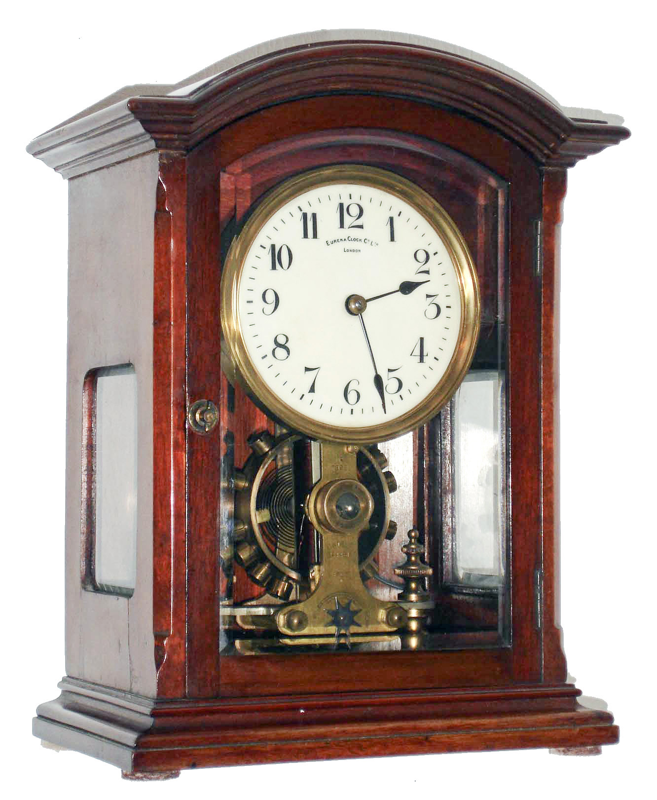 Eureka Clock Co, Ltd, London, England battery powered mantel clock with oversized balance wheel movement in an mahogany case with beveled glasses and cream enamel dial, c1906 s#7999 — Antique Clocks Price Guide