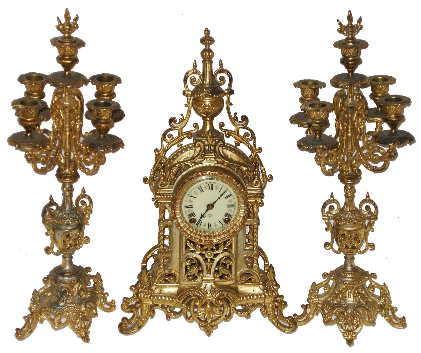 Ansonia Clock Co., Brooklyn, New York, "Tauric" set of cast metal 8 days, time and strike, mantel clock and candelabra pair, c1901 — Antique Clocks Price Guide