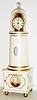 Simon Willard lighthouse bridal clock reproduction by the Petrick Clock Company of Port St. Lucie Florida, 8 day, time only, weight driven movement with a t-bridge, anchor recoil escapement and polished solid brass plates. The movement is mounted in a hand turned solid hardwood painted case, with hand blown glass dome and painted roman numeral dial, c2000