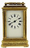 French miniature carriage clock, 8 day, time only, spring driven movement with lever platform escapement in a gilt Gorge case with foliate engraving and inset with three painted enamel panels depicting peasants in pastoral scenes, white enamel dial, c1880