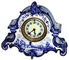 Ansonia Clock Co., Brooklyn, New York, "La Porte" shelf clock, 8 days, time and strike, spring driven movement in a Delft style porcelain case, c1895