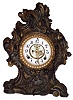 Ansonia Clock Co., Brooklyn, New York, "Rococo" shelf clock, 8 days time and strike, spring driven movement, with visible escapement, in a bronzed cast metal case, c1894,