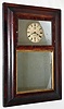 Litchfield Manfg. Co., Litchfield, Conn., mirror clock, 8 days time only, spring driven balance wheel movement in a mahogany case, c1850,