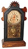 Gilbert Clock Co., Winsted, Conn., "Jet" 8 days, time, strike & calendar ebonized shelf clock, c1885