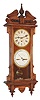 Waterbury Clock Co., Waterbury, Conn., "Calendar No. 33" 8 day, time and strike, double dial calendar clock in oak, c1908