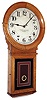 E. Howard & Co., Boston, Mass., "No. 70 Regulator" with 16" dial, wall clock, 8 days, time only, weight driven movement in an oak case with painted metal dial and reverse painted lower tablet, c1890