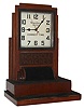 Waterbury Clock Co., Waterbury, Conn., "Electric Advertising" for Ingersoll Watch Co., shelf clock, time only, electric driven movement in a mahogany case with velvet lining to display Ingersoll watches, c1930