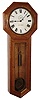 Seth Thomas Clock Co., Thomaston, Conn., "Regulator No. 18", wall clock, 8 days, time only, weight driven movement in an oak case with painted metal dial and 8" diameter pendulum bob, c1890