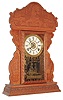 E. N. Welch Mfg. Co., Forestville, Conn., "Dewey", 8 day, time and strike, and alarm, pressed oak case kitchen clock.  This was one of the commemorative series produced by Welch.   c1900