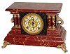 William L. Gilbert Clock Co., Winsted, Conn., "Blackbird" variant, 8 day, time and strike, marbleized enameled mantel clock. This clock looks to a variation on the Blackbird model with different hardware, c1904