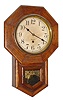 Clocks- 2 (Two): Waterbury Clock Co., "8 Inch Drop", 8 day, oak case school house type wall timepiece, c1910 and a Seth Thomas Clock Co., "Nursery" spring driven wall clock with painted wooden dial depicting circus animals