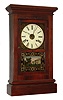 Waterbury Clock Co., Waterbury, Conn., 30 hour, time and strike, weight rosewood veneered cornice shelf clock. c1865
