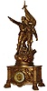 Large French figural clock, 8 days, time only, movement, gilt spelter case supported on acanthus decorated feet with Corinthian pilasters at the corners, case sides with tropical landscapes, the front with a chained slave to the left of the dial, and a crowned female figure holding the end of the chain to the right, the case top with two soldiers before a planted flag, one wounded, supported and defended by his comrade, sculpture signed but illegible, white enamel Arabic numeral dial with gilt, sunk center, gilt bezel with thick beveled glass, c1900