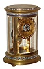 French crystal regulator, Japy Freres 8 days, time and strike, movement, counting the hours on a gong and a single blow at the half hour, the gilt oval case with beveled glasses and cloisonne bands at the top and bottom, gilt Arabic numeral dial signed "A. Stowell Boston", with cloisonne border and center, blued steel hands, gilt pendulum with miniature portrait of a fashionable woman behind glass, signed "T. Karl", c1900