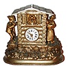 Mayer, Germany, 30 hours, novelty clock in a silvered cast iron case, the oval base with rocks and foliage, with a log cabin above, the male figure on the left looking in the window, his head rocking back and forth as the clock ticks, while on the right side, a woman and man embrace, the white enamel Roman numeral dial mounted to the front of the structure, while a panting dog emerges from a window above the clock, his tongue moving in and out as the clock runs, tall rectangular plate movement similar to a Zappler, the back plate signed "Mayer", c1865