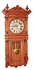 Waterbury Clock Co., Waterbury, Conn., "Atlanta", wall clock, 8 days, time and strike, two brass weight driven movement in an oak case with silvered metal dial, c1893
