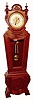 Waterbury Clock Co., Waterbury, Conn., "Regulator No. 62" floor standing regulator, 8 days, time and strike, two weight driven movement in a mahogany case with unusual keystone shape with silvered dial and raised brass numerals and fancy center, c1890