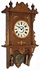 Waterbury Clock Co., Waterbury, Conn., "Study" oak 8 days, time and strike, 2 weight open-well wall clock, c1891