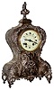 French repousse hallmarked silver mantel clock with Vincenti 1855 8 days, time and strike, balance wheel movement, c1870