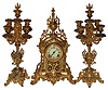Ansonia Clock Co., Brooklyn, New York, "Tauric" set of cast metal 8 days, time and strike, mantel clock and candelabra pair, c1901