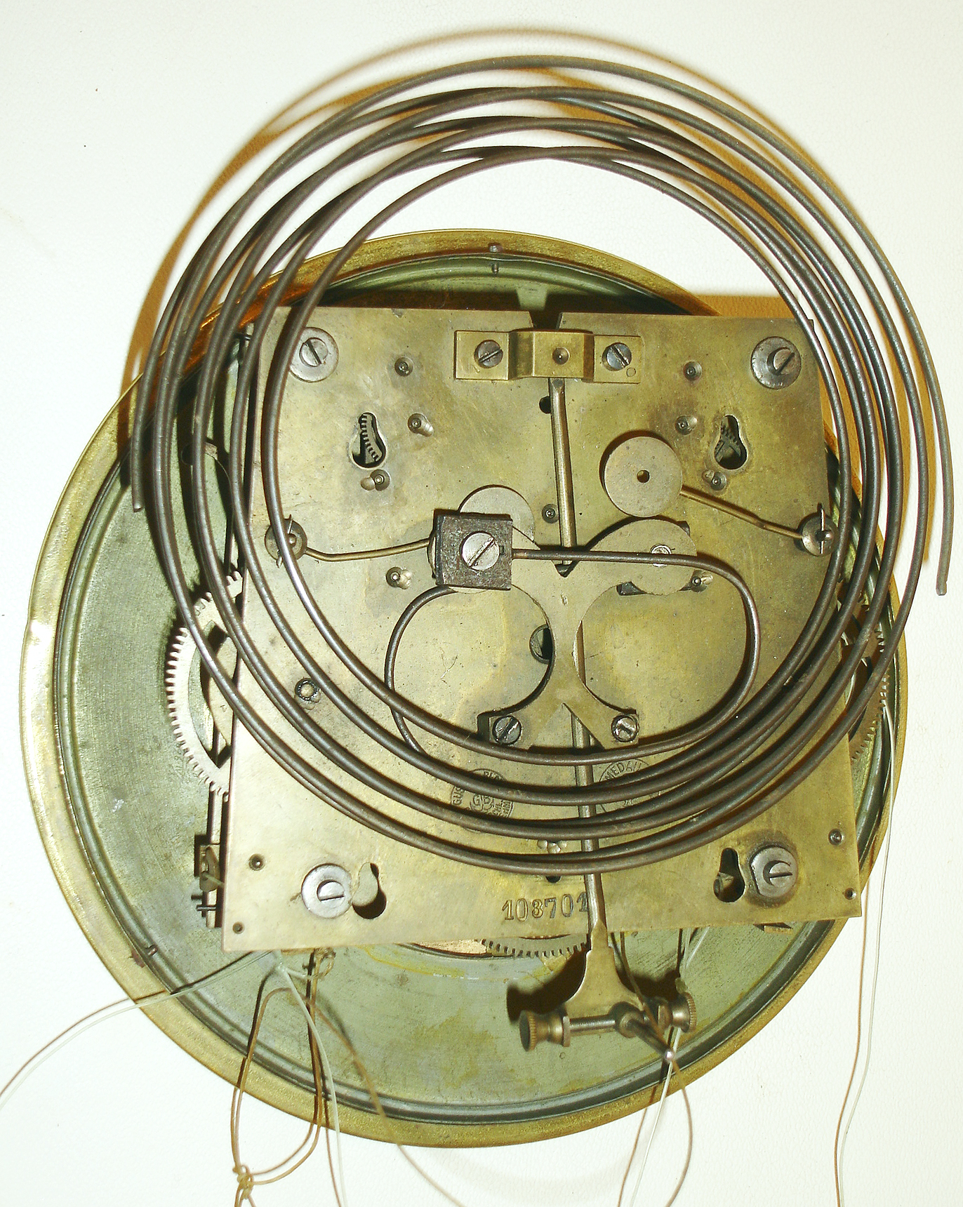 Gustav Becker, Freiburg, Germany, Vienna Regulator, 8 days, time and grande sonnerie strike, three weight driven movement in a carved walnut case with brass ornamentation and silvered dial with engraved brass center, matching engraved pendulum bob and weights, c1890 — Antique Clocks Price Guide