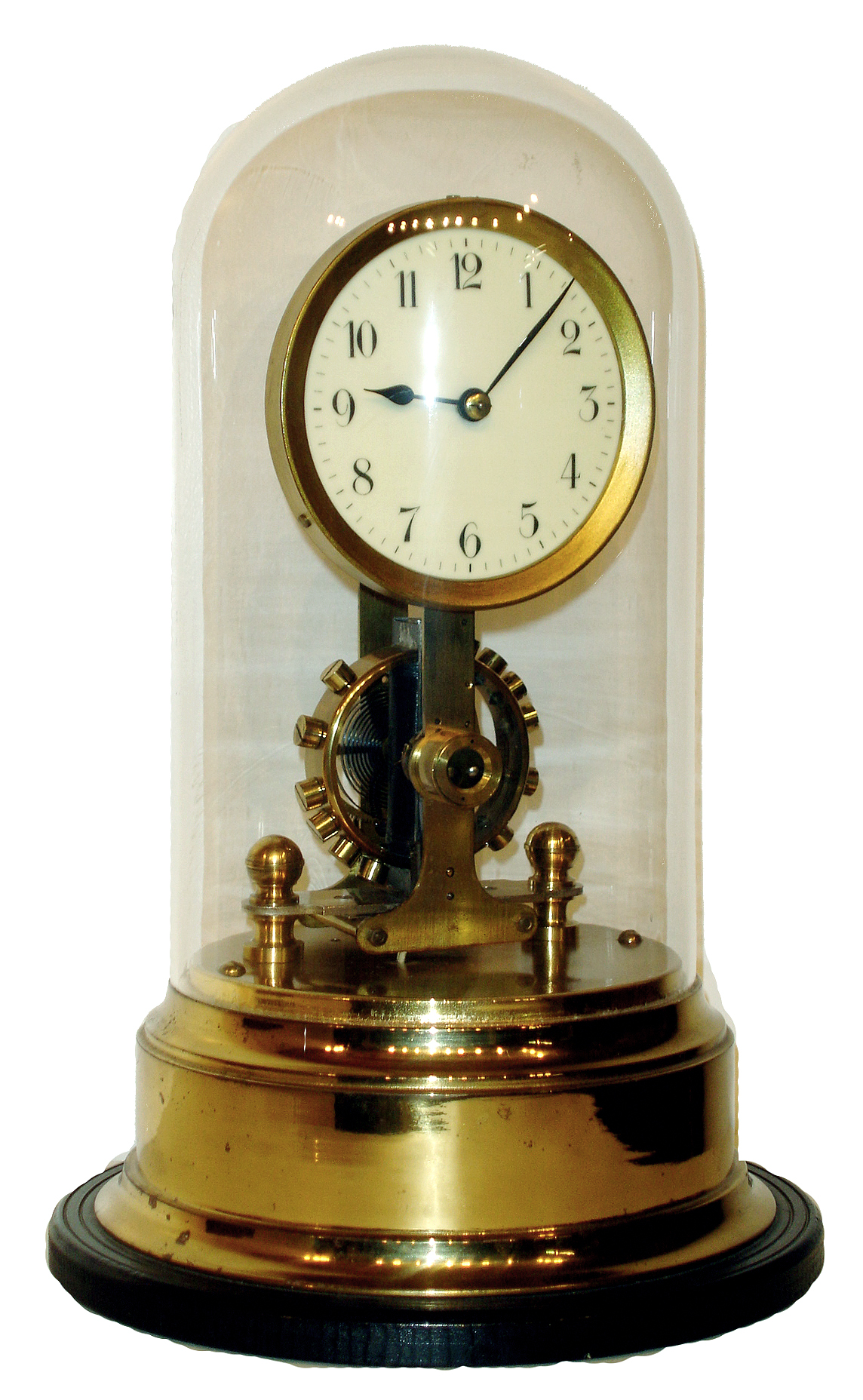 German Eureka, battery powered, electro-magnetic clock mounted on brass base under dome with large exposed rotating balance, c1910 — Antique Clocks Price Guide