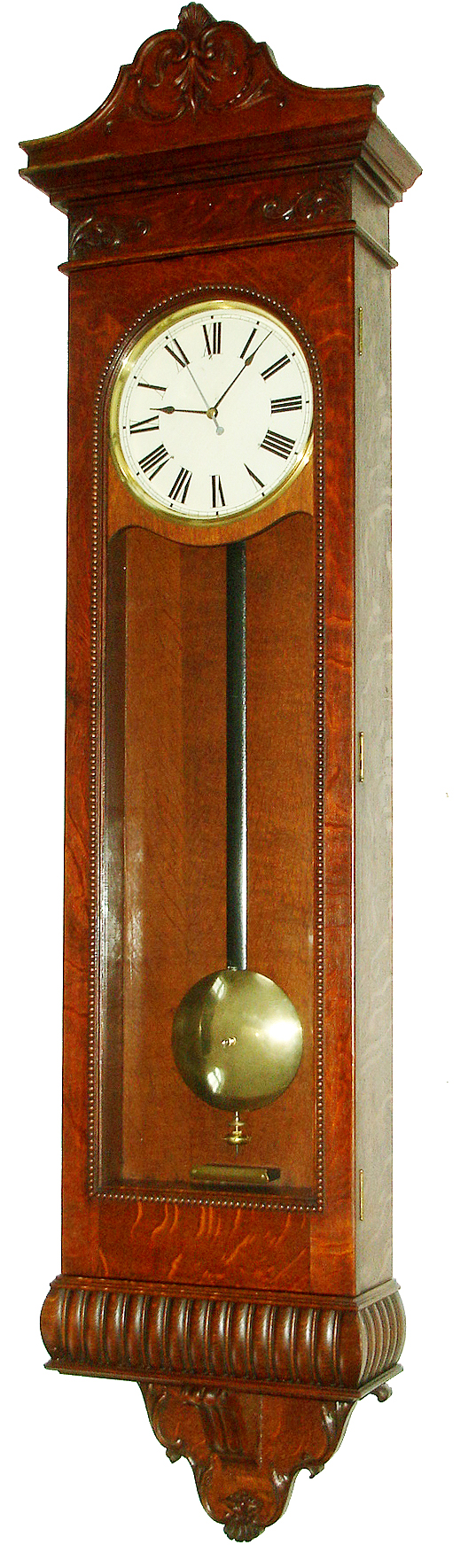 New York Standard Watch Co., Jersey City, N.J., "Fisher Electric Clock" wall clock, time only, electric movement with second's beating pendulum in an oak veneer case with painted metal dial, c1896 — Antique Clocks Price Guide