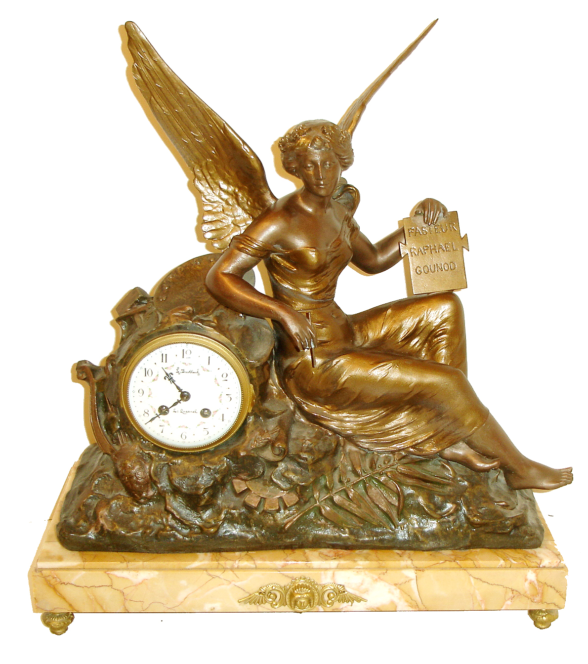 French, figural mantel clock, the winged spelter figure of Goddess of the Arts bearing a tablet in her left had with the names Pasteur [Louis - health research]], Raphael [Artist] and Gounod [composer], her right arm resting over a good French time and bell strike clock, with porcelain dial, the whole mounted to a large piece of tan variegated marble, c1890 — Antique Clocks Price Guide
