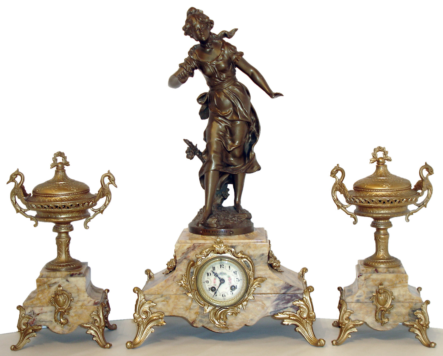 French 3 piece mantel garniture, multi colored marble clock case with gilt rococo style ornament, mounted with a patinated figure of a young woman entitled "Les Favoris", after a sculpture by Aug. Moreau, side pieces with covered urns mounted to marble bases matching the clock case, the urn handles with birds, all on gilt acanthus decorated scroll feet, the bezel with thick beveled glass, Arabic numeral white enamel dial with polychrome floral decoration, blued steel hands, 8 days, time and strike, Pendule a Paris movement marked Samuel Marti, c1900 — Antique Clocks Price Guide