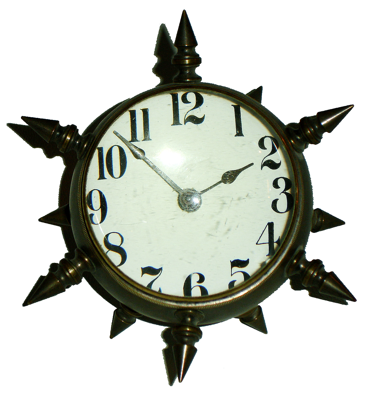 New Haven Clock Co., desktop novelty, the "MACE, T.P.", the decorative mace case held on with a screw from the rear; inner cover removed for winding and setting, c1886 — Antique Clocks Price Guide