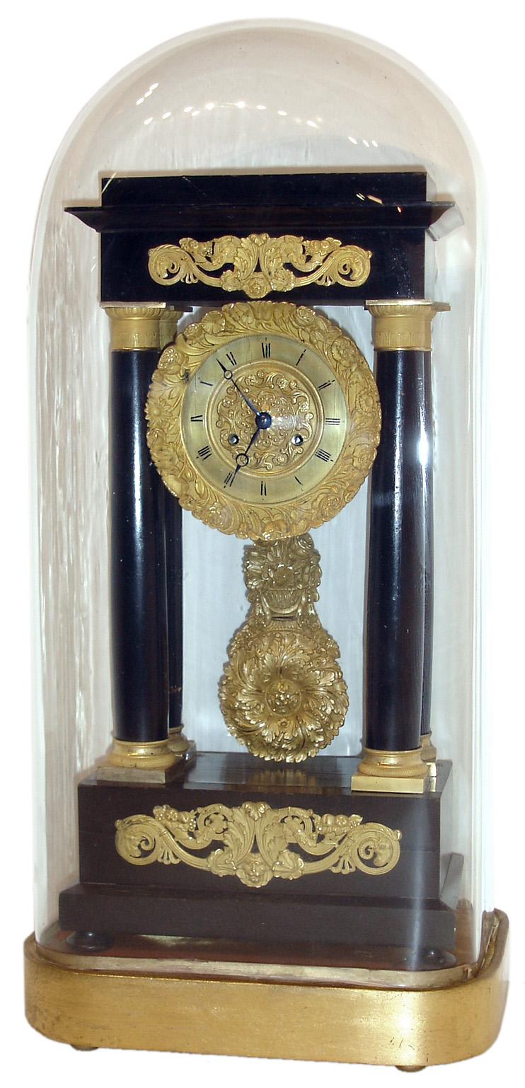 French portico clock, ebonized wooden case with gilt bronze mounts, Roman numeral gilt dial with cast center, bezel and pendulum with floral ornament, 8 days, time and strike, Pendule a Paris movement, with gilt base and dome, c1830 — Antique Clocks Price Guide