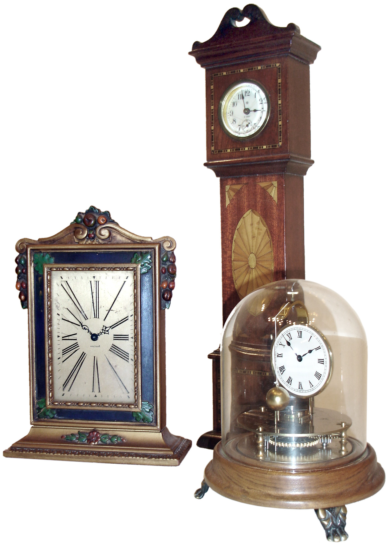Clocks- 3 (Three) time-only desk clocks: Waltham polychrome 8 days, library clock; Horolovar reproduction of Briggs Rotary; and Ansonia 8 days, miniature inlaid mahogany grandfather clock — Antique Clocks Price Guide