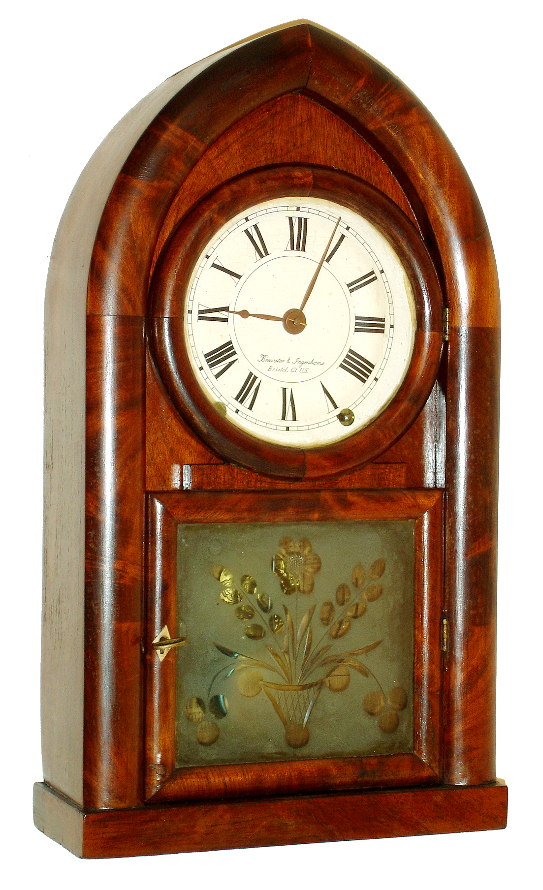 Brewster &amp; Ingrahams, Bristol, Conn., beehive or "Round Gothic" mantel clock, 8 days, time and strike, spring driven brass movement in a mahogany veneer case with painted metal dial and cut and etched tablet, c1845 — Antique Clocks Price Guide