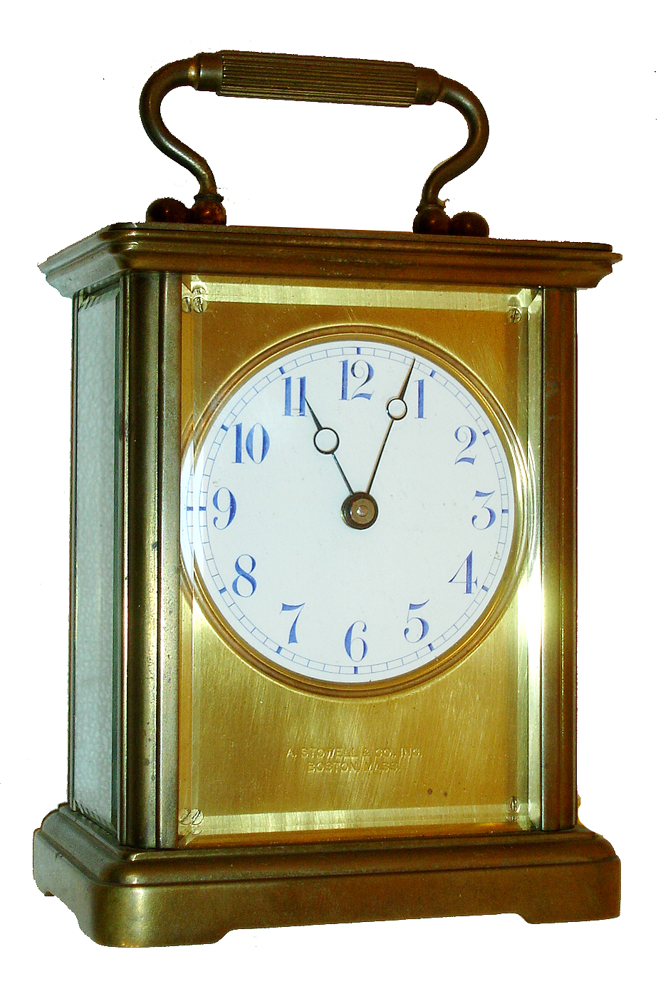 Chelsea Clock Co., Chelsea, Mass., for A. Stowell &amp; Co., Boston, carriage clock, gilt case with beveled glass panels, Arabic numeral white enamel dial, 7 jewel 8 days, time only movement with lever escapement, serial #37394, c1915 — Antique Clocks Price Guide