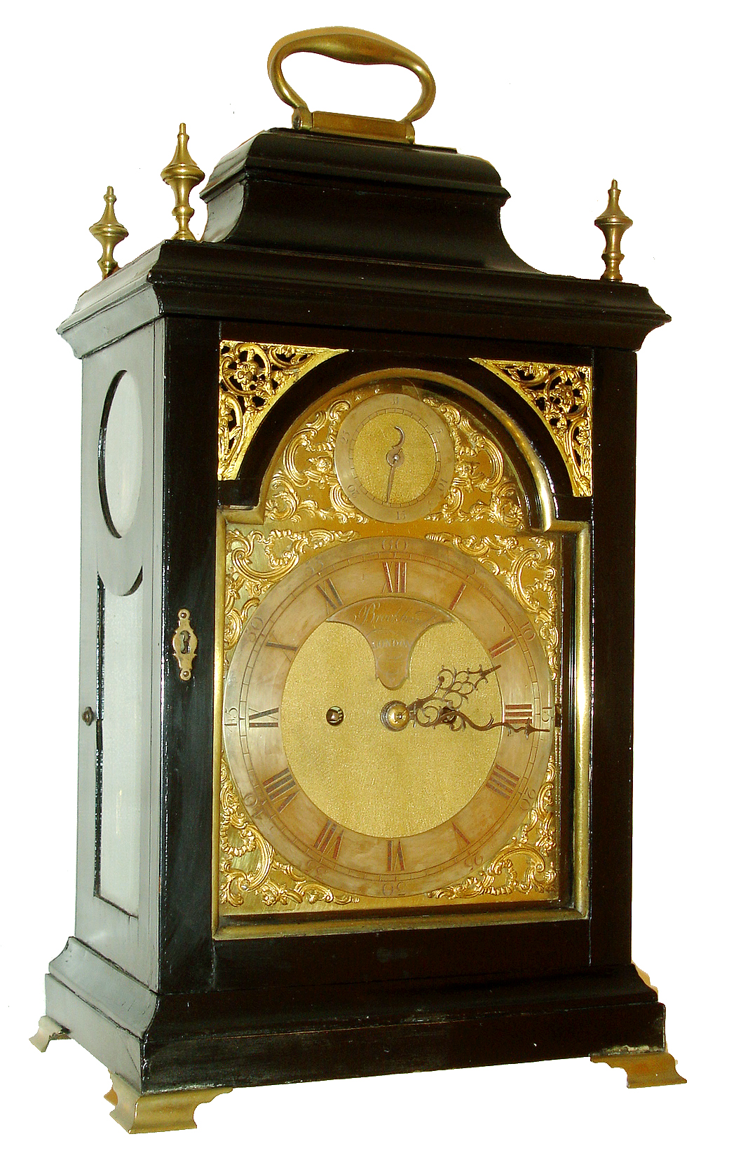 Brockbank, London, Georgian bracket clock with calendar, veneered ebonized case with brass feet, handle and finials, door with gilt cast frets and brass trim, composite dial signed "Brockbank London", with silvered chapter ring, gilt spandrels, and date display in arch, blued steel hands, 8 days, fusee time and strike, movement with verge escapement and pull repeat, back plate engraved with C scrolls and pagoda, c1770 — Antique Clocks Price Guide