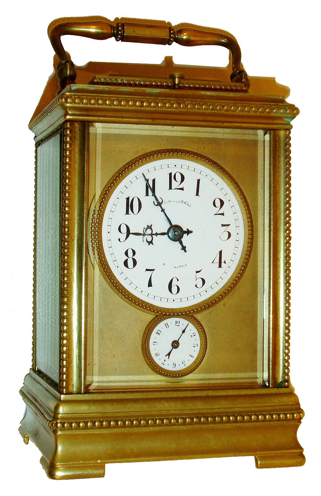 French petit sonnerie striking carriage clock with alarm for G.W. Russell, Philadelphia, gilt brass case with beaded trim, beveled glass panels, Arabic numeral white enamel dial with gilt mask, blued steel hands, 8 days, time and strike, movement with lever platform, striking the hours, petit sonnerie quarters, and repeating the last hour and quarter on demand, with velvet lined leather bound travel case, c1910 — Antique Clocks Price Guide