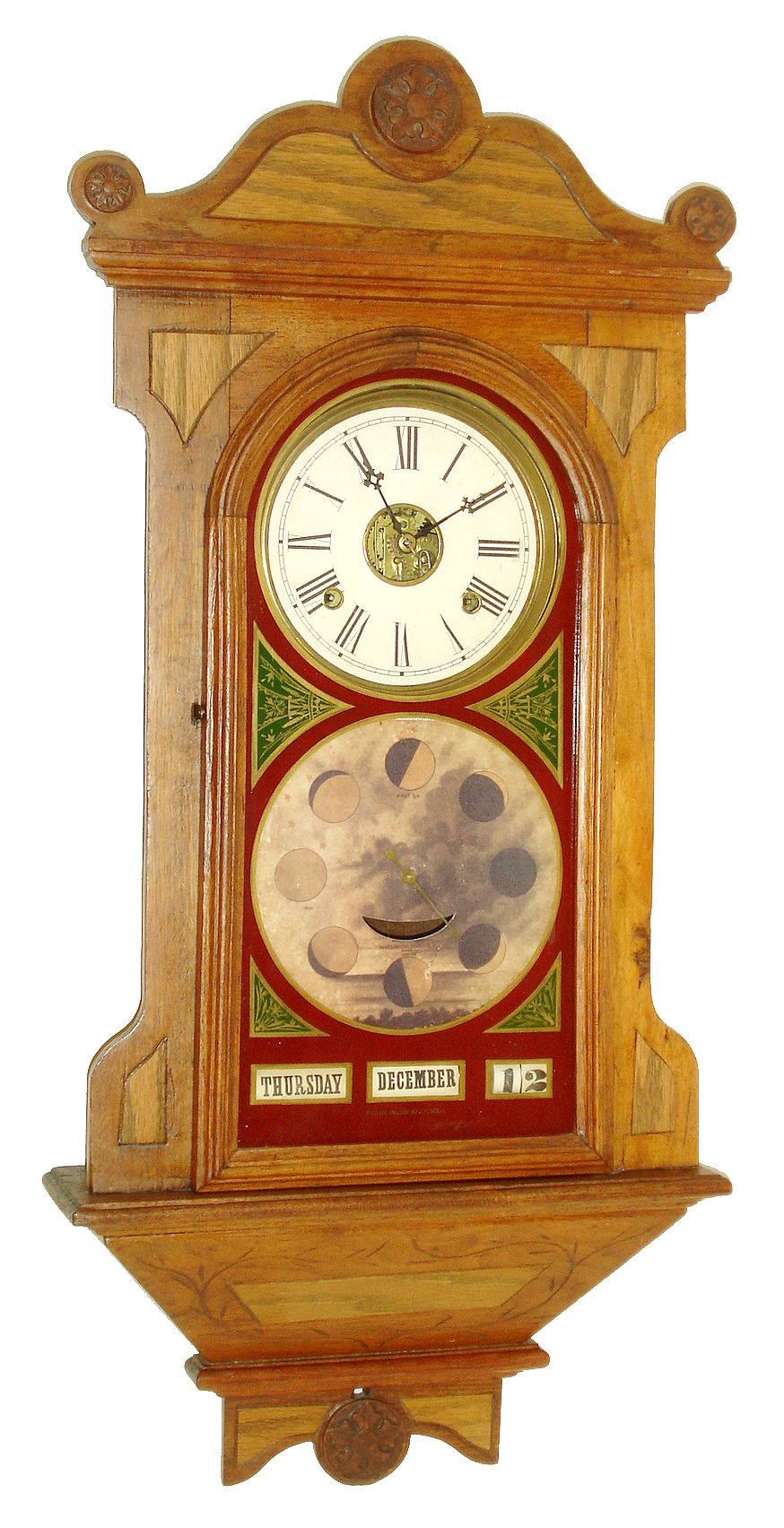 Macomb Calendar Clock Co., Macomb, IL, "Hanging Calendar" model 8 days, time and strike, spring driven wall clock with calendar and moon phase dial, c1883. — Antique Clocks Price Guide