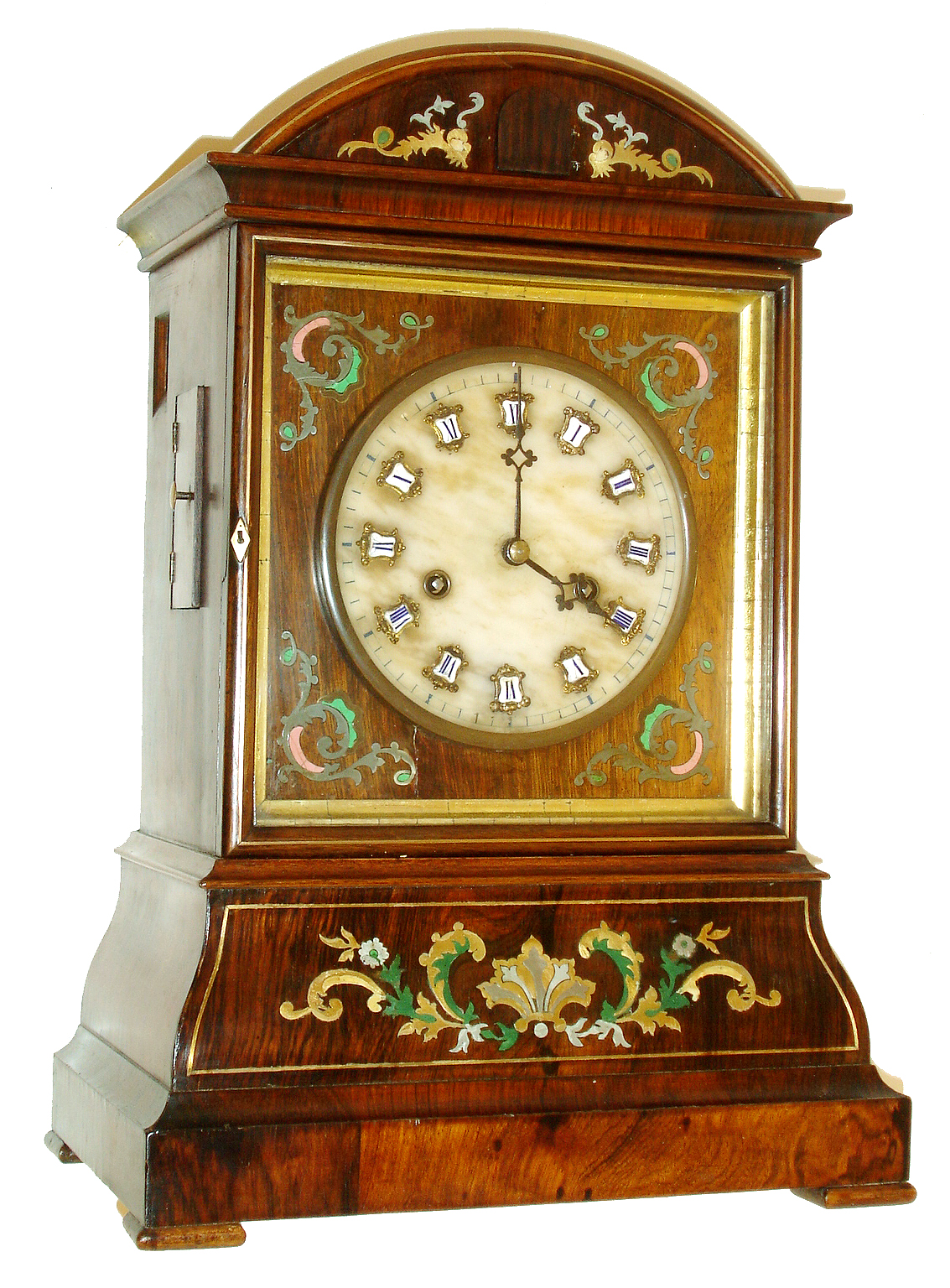 Johann Baptist Beha, Eisenbach, unusual early shelf cuckoo for the English market, Brazilian rosewood veneered case with inlays of brass, pewter, and turtle shell, alabaster dial with Roman numerals on ceramic cartouches, each with its own ornamental gilt frame, dial with veneered and inlaid surround, blued steel hands, 8 days, fusee time and strike, movement with wooden plates, wooden pipes with marbled paper covering, inside of back with Beha label, and date 7/2/69, and also the label of Camerer Cuss, the clocks retailer — Antique Clocks Price Guide