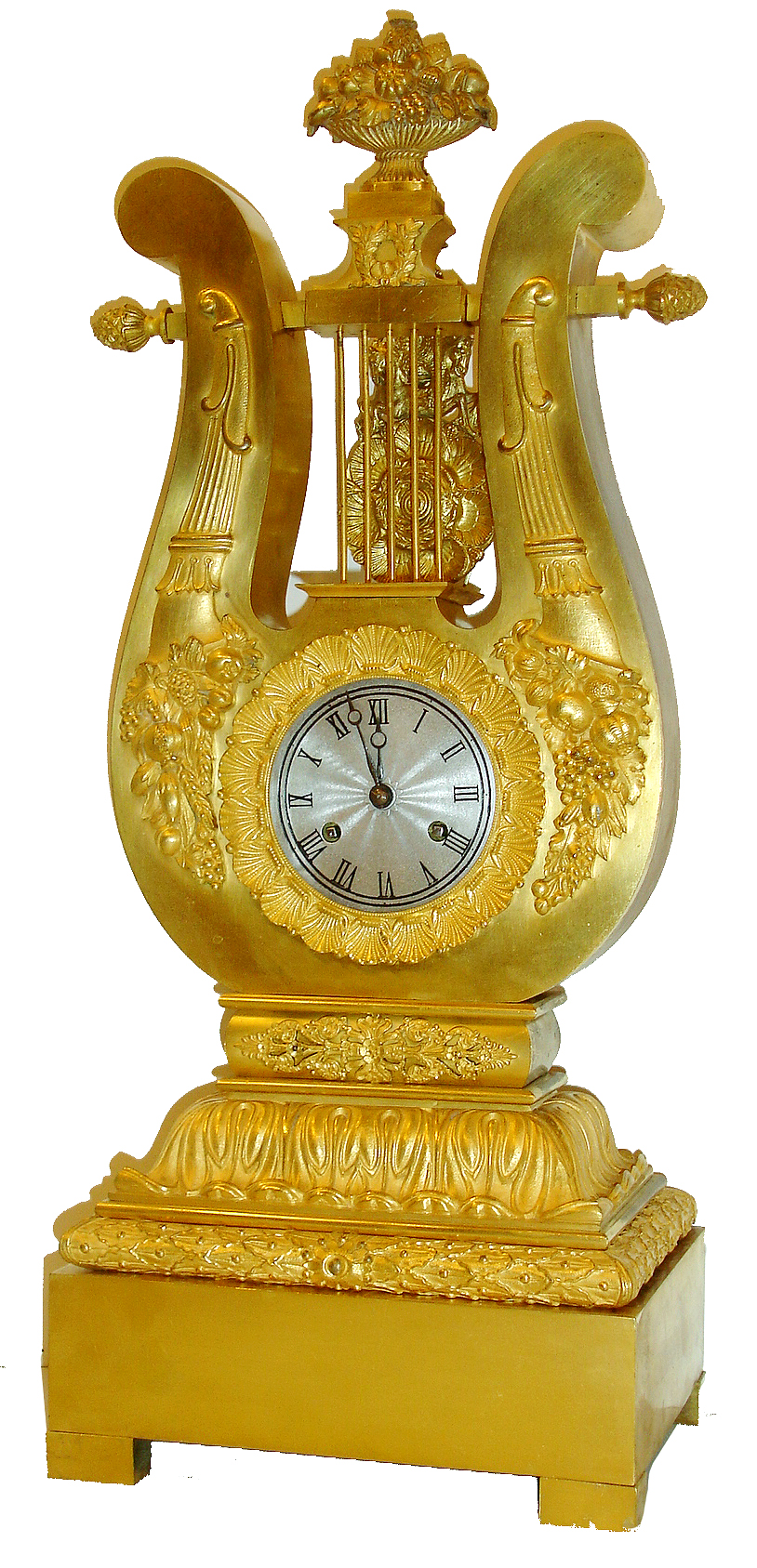 French mantel clock, gilt bronze lyre form case with pendulum oscillating behind the "strings", ornamented with gilt mounts of waterleaf, anthemion, and horn of plenty with an overflowing fruit basket at top, scallop shell bezel, pendulum also decorated with scallop shells and sea horses, 8 days, time and strike, Pendule a Paris movement, Roman numeral, engine turned, silvered dial, blued steel Breguet style hands, c1830 — Antique Clocks Price Guide