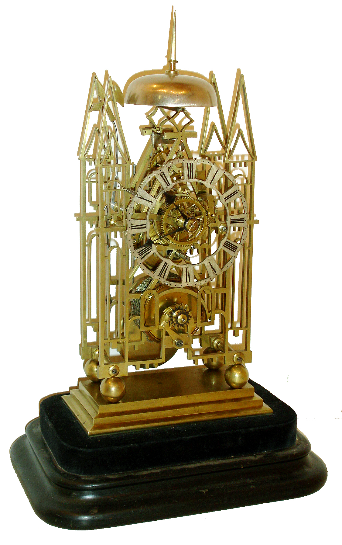 J. Smith and Sons Clerkenwell, [attributed] skeleton clock, cathedral form plates with delicate piercing and decorative turned baluster form pillars, on ball feet and with stepped base, engraved Roman numeral silvered dial with pie crust edge, blued steel hands, brass pendulum with decorative star form steel ornament at center, 8 days, single fusee movement with recoil escapement and passing strike, all mounted to a velvet lined ebonized wooden base with glass dome, c1850 — Antique Clocks Price Guide