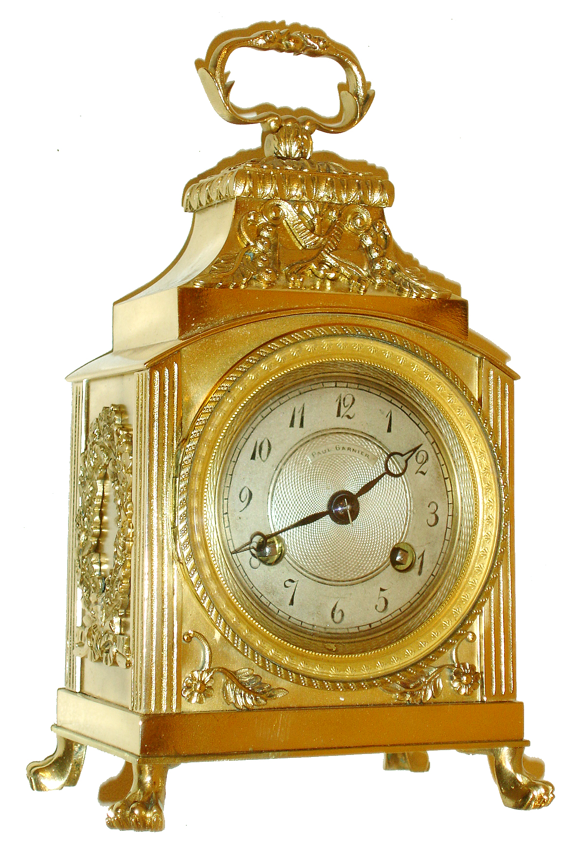 French pendule d' officier style travel clock, brass case with classically inspired ornament, resting on paw feet, engine turned bezel with convex glass, Arabic numeral, engine turned silvered dial signed "Paul Garnier", blued steel Breguet style hands, 8 days, time and strike, round movement with lever platform, c1890 — Antique Clocks Price Guide