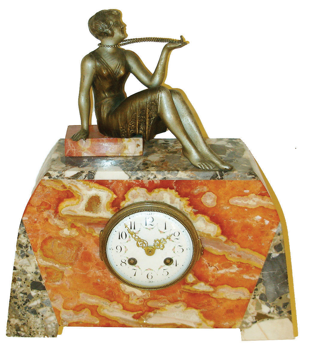 F. Marti, France, Art Deco style mantel clock, the case of contrasting marbles, top with a spelter figure of a seated young woman, gilt bezel with convex beveled glass, Arabic numeral white enamel dial with floral garlands, gilt Louis XV hands, 8 days, time and strike, Pendule a Paris movement, c1920 — Antique Clocks Price Guide