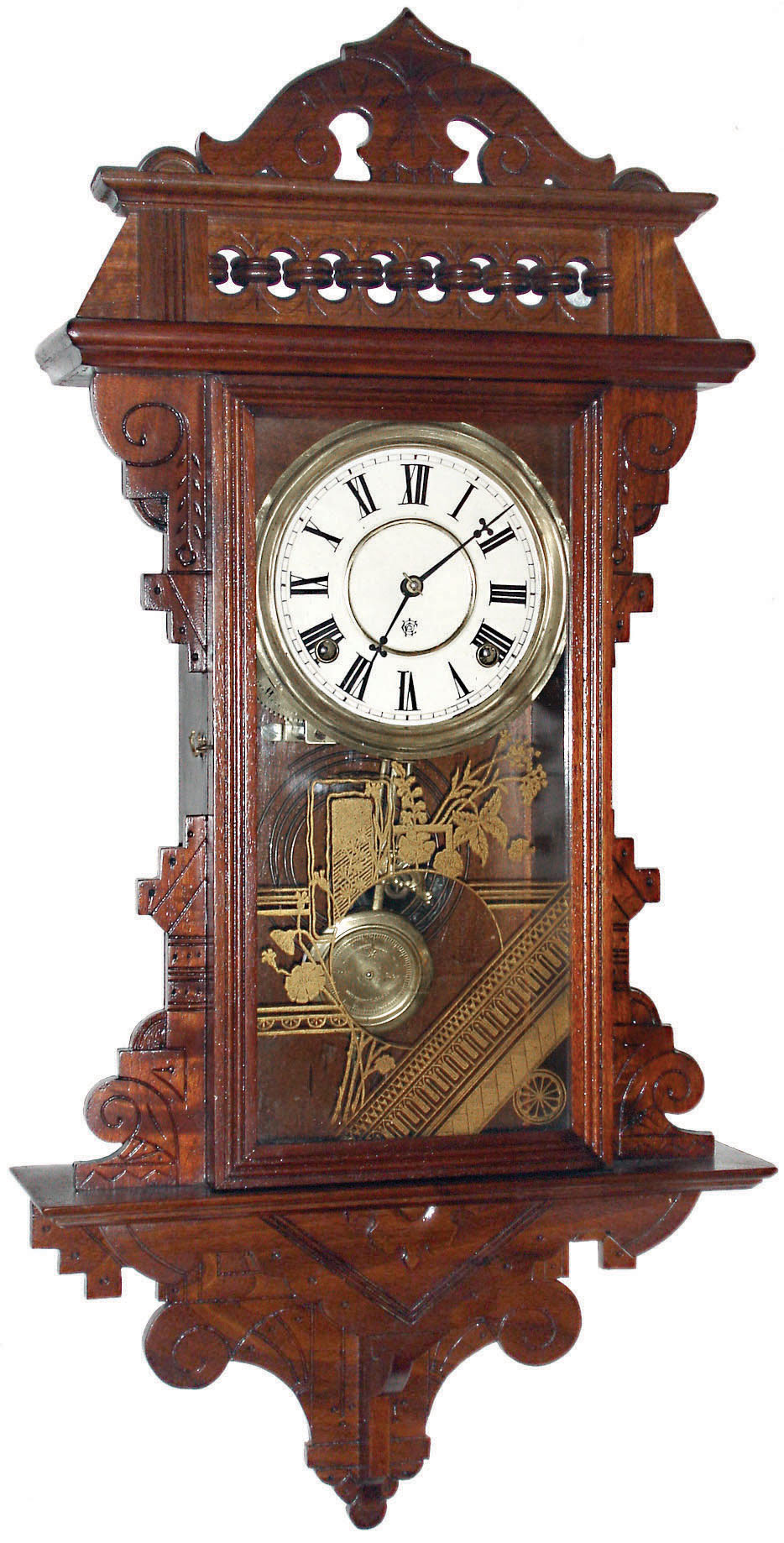 Waterbury Clock Co., Waterbury, Conn., "Lawrence" walnut 8 days, time and strike, hanging gingerbread wall clock, c1891 — Antique Clocks Price Guide