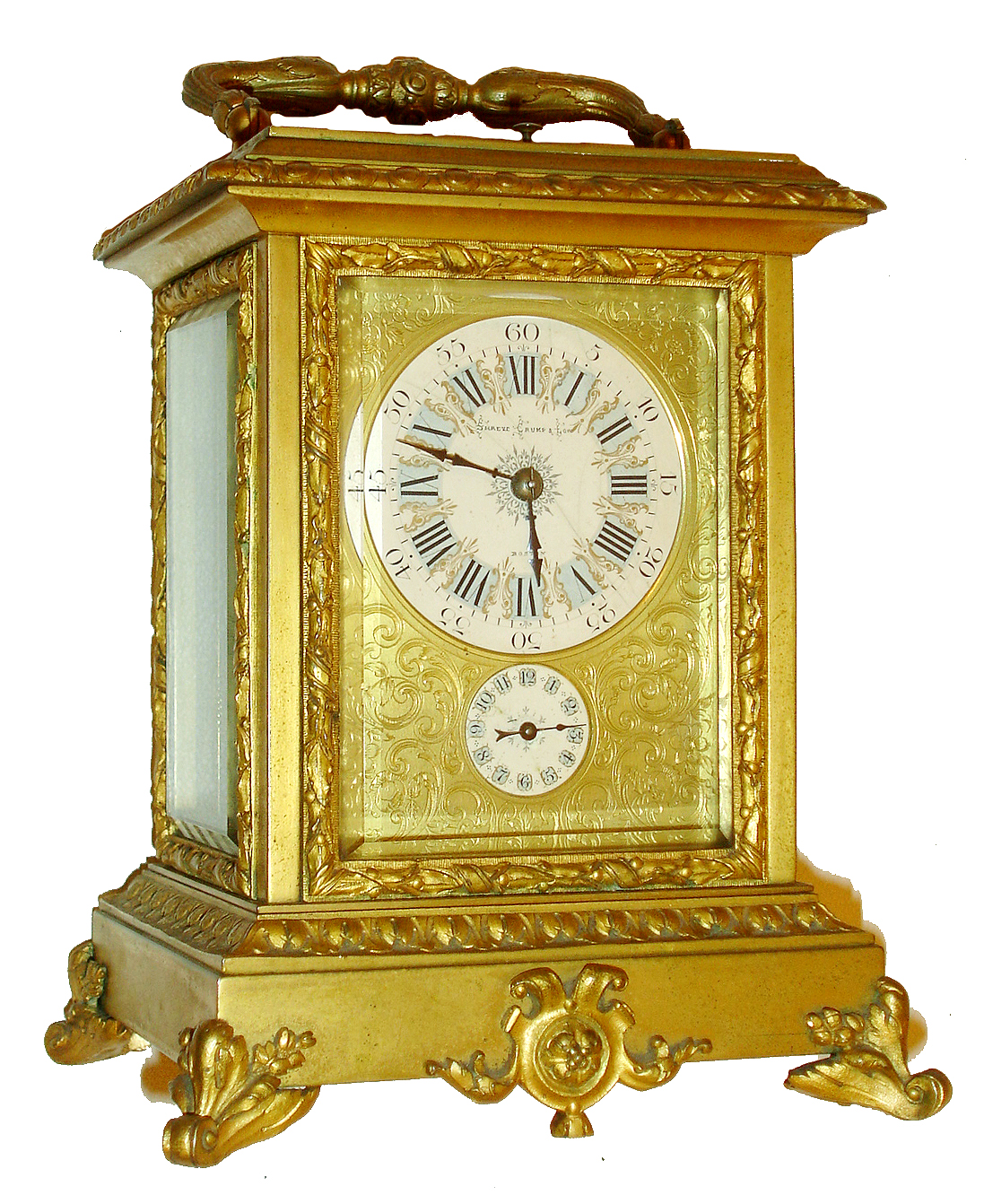 French repeating carriage clock with grand sonnerie striking, gilt case on scrolled feet with foliate ornament, ornate base molding, glass frames, and handle, case with beveled glasses, Roman numeral white enamel dial, the dark blue figures on pale blue grounds with gilt borders, and signed "Shreve, Crump, and Low Boston", dials with gilt mask with acanthus and c scroll engraving, blued steel hands, brass time, strike and alarm movement with lever platform, with lever to select grand or petit sonnerie, or silence, and repeating the last hour and quarter on demand, with travel case, c1890 — Antique Clocks Price Guide
