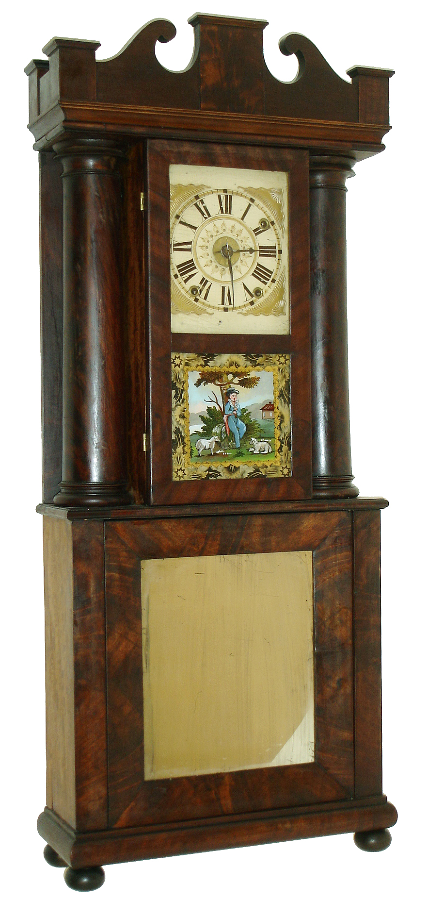 J.J. Beals, Boston, 30 hour, time and strike, weight wood movement c1835, in a mid 20th century hollow column case? This is a difficult clock to assess as it is not typical and was most likely custom made; pinning down a construction date is not easy.  Dr. Shaffer had bought this later in life when perhaps his eyesight was failing a bit, as the overall visual experience is stunning, however close inspection shows modern construction methods on the case. — Antique Clocks Price Guide