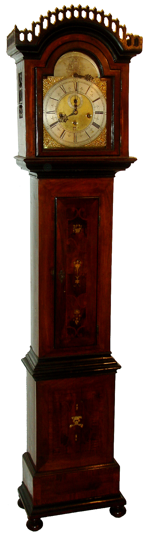 Jurgen Luther, Copenhagen Denmark, walnut cased musical movement C.1730, in a later case of oak with walnut veneers, and inlays of ash, and incised ivory, on turned compressed ball feet, and with heavy ebonized moldings, bonnet sides with fabric lined openwork fret, top also with similar treatment, composite dial with matted center, gilt spandrels, silvered chapter ring and arch with engraving, possibly a coat of arms, steel chime selection indicator, and with the names of the tunes above, pierced blued steel hands, 8 days, 3 train weight driven movement with 6 nicely turned pillars, striking the hours on a large bell, and playing one of nine tunes on a nest of eleven bells, pinned cylinder 2 inches in diameter and 7 3/4" long, activating 22 hammers. — Antique Clocks Price Guide