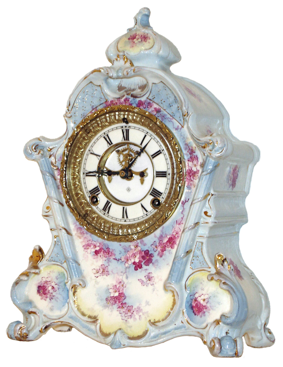 Ansonia Clock Co., New York, N.Y., "No. 502" Royal Bonn porcelain clock, 8 days, time and strike, spring driven movement with open escapement in a blue and white multicolor floral case, two part enamel dial, c1910 — Antique Clocks Price Guide
