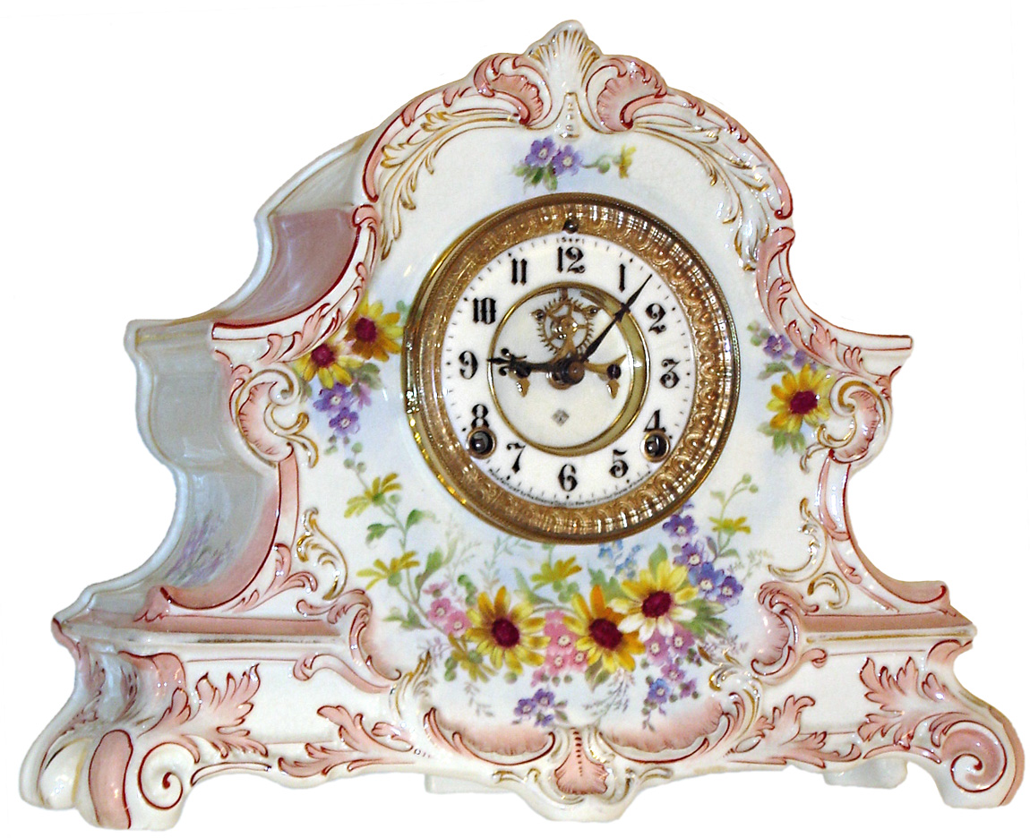 Ansonia Clock Co., New York, N.Y., "La Nord" Royal Bonn porcelain clock, 8 days, time and strike, spring driven movement with open escapement in a pink and multicolor floral case, c1905 — Antique Clocks Price Guide