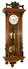 Clocks- 2 (Two) German/Austrian walnut 8 days, Vienna Regulator wall clocks, one 2-weight, one 1-weight, late 19th century