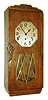 Clocks- 3 (Three) 8 days, Westminster-chime 3-train spring-wound solid oak wall clocks, 2 French, 1 German, early 20th century